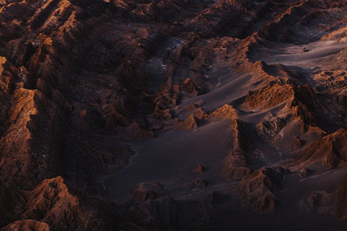Abstract aerial fine art photograph of textured clay ridges in the Atacama Desert Chile by Basile Tournier